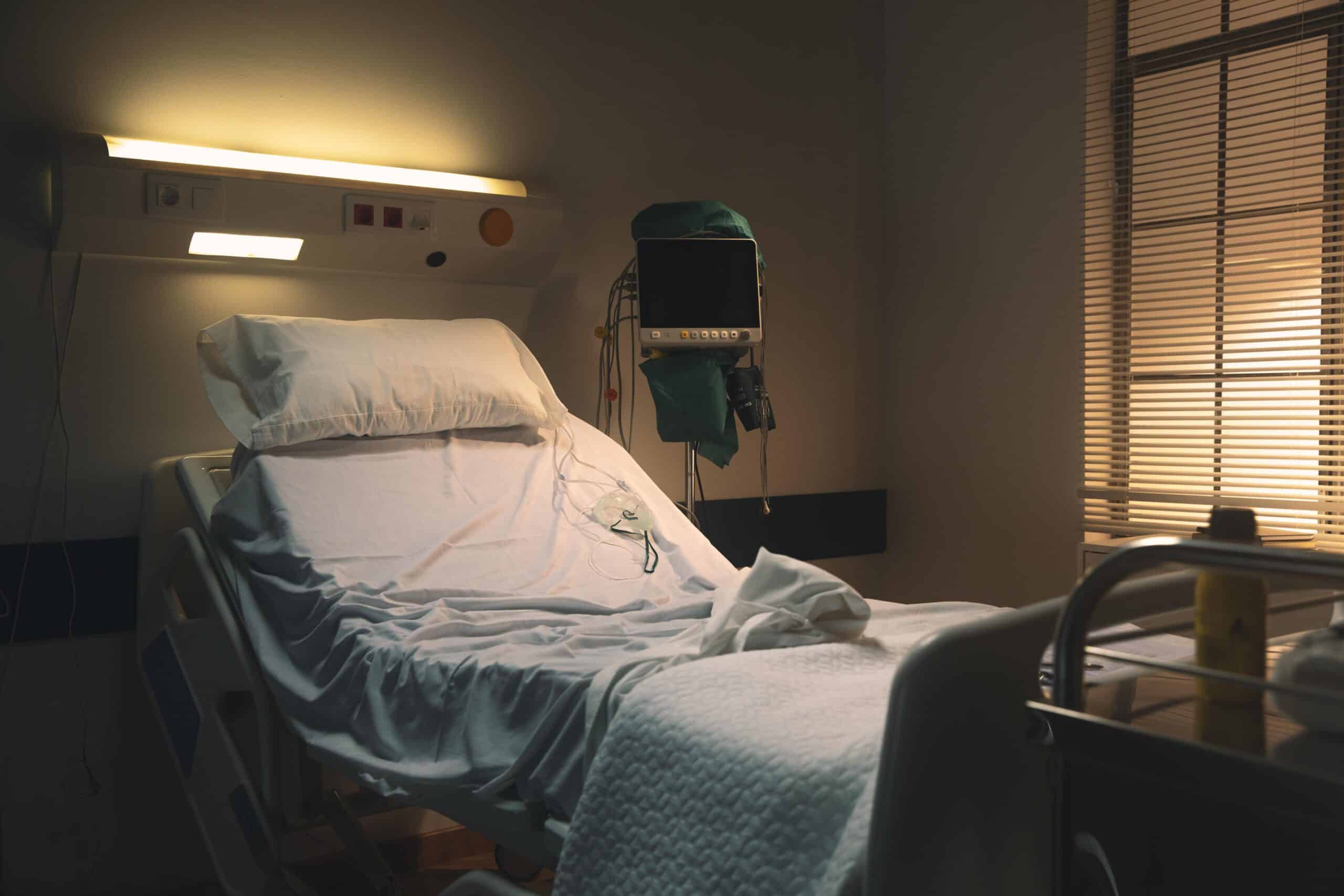 Home hospital bed with electric adjustment, mattress topper, and medical pillows
